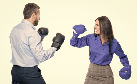 corporate competition between business partners. businesspeople ready to fight. working competition. businesspeople in boxing gloves isolated on white. business competition. negotiators conflictの写真素材