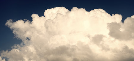 Blue Sky with Fluffy White Clouds on a Sunny Summer Day. Cloudscape - Blue sky and white clouds....