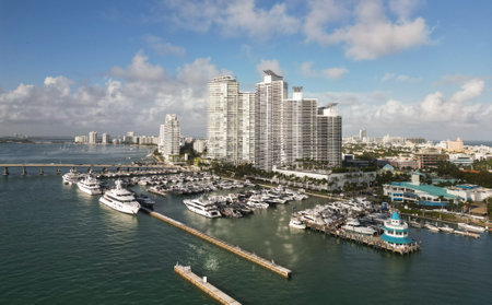 Summer vacation. Marina dock. Luxury South beach marina. Miami south beach view. Docked luxurious yacht boat. Luxurious lifestyle. View of luxury Miami Florida. Serene marinaの写真素材