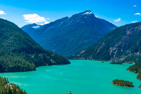 Scenic nature view over Diablo lake. Diablo lake with mountain landscape. Landscape of mountain peak...
