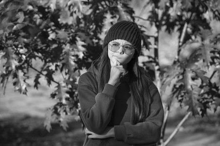 autumn outdoor. girl in autumn style. teen girl wear sunglasses. autumn fashion girl. trendy and...