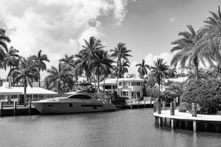 Summer holidays on luxury yacht. Enjoying summer vacation on boat in the sea with villa. Summer vacation with a speed boat yacht. Summer vacation. Yacht boatの写真素材