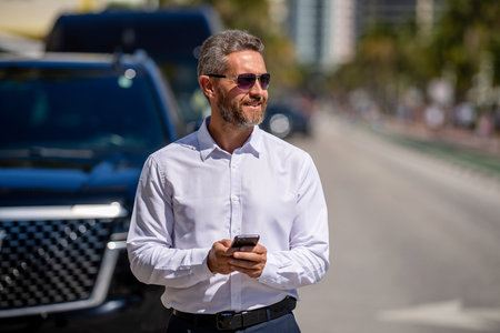Corporate business. Business man chat on phone outdoor. Businessman chatting on phone. Businessman...