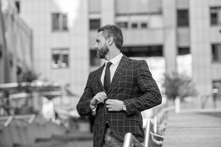 Businessman after business successful meeting in city. Business success of businessman. Businessman in formal suit. Rich man in suit. Financial district. Business success man outdoor. Visionary CEOの写真素材
