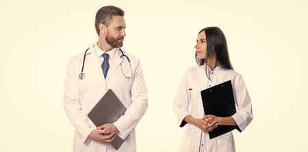 doctor internist with clipboard isolated on white. prescriber physician with nurse. prescription....