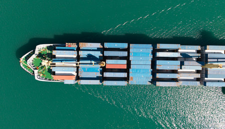 Cargo ship with container, aerial top view. Freight container on cargo vessel. Cargo ship vessel...