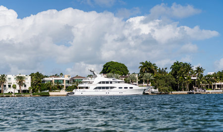 Luxury boat motor yacht at sea. Yachting boat tourism. Luxury lifestyle. Vacation on summer. Yacht at sea. Motorboat yacht sailing at sea. Charter motorboatの写真素材