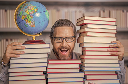 school teacher with book literature. education in school library. man bookworm getting knowledge....