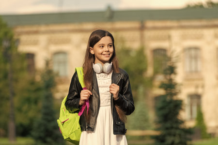 Adolescence lifestyle. Teen girl school student outdoor. Teenery lifestyle. Student life. Listen...