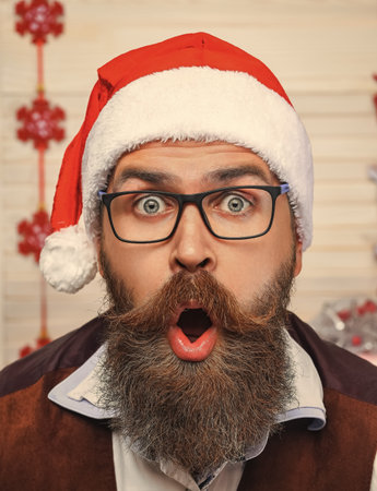 Xmas holiday celebration. Santa man in retro style with moustache. Cozy Christmas at home. Man...
