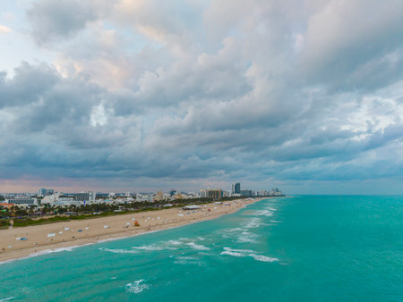 Aerial view of Miami city by the coast. Miami skyline with oceanfront skyscrapers. Scenic Miami panorama of Florida famous coastline. Drone shot of Miami above the shore.の写真素材