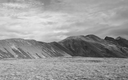 Countryside landscape with mountain. Autumn mountain landscape. Nature of Iceland. Fall nature in mountain countryside. Scenery landscape of mountain. Scenery autumn countryside. Travel destinationの写真素材