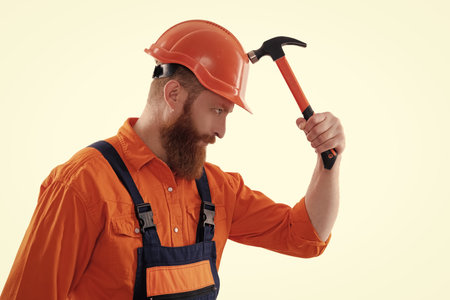 Workman repairing with hammer isolated on white. Repair man work. Surface repair. Carpentry and...