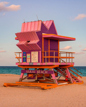 Lifeguard over Miami beach. Panoramic seascape of Miamis famous coastline. South Miami Beach. Miami Beach jetty. Rescue tower against the blue sky in Miami. Beautiful coastal view of Florida.の写真素材