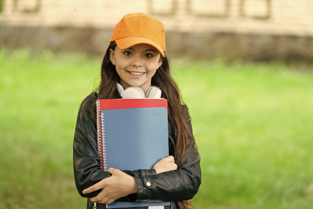 September is school time. September 1. Knowledge and education. Knowledge day in September. Girl in...