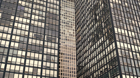 Glass building window. Architectural detail. Background of architecture. Modern glass background....