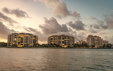 Fisher island. Travel destination. Fisher island night view. Night aerial view of Fisher island, Miami. Miami beach with waterfront architecture. Miami residential building, Florida. Luxury lifestyleの写真素材