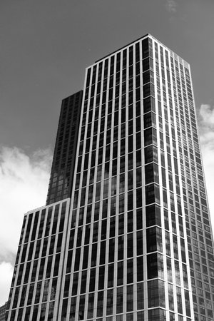 Modern skyscraper building. Architectural building in metropolis. Skyscraper perspective view. City...