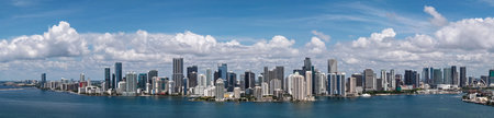 Aerial panorama of Brickell in Miami. Downtown Miami skyline on a sunny day. Scenic view of Miami...