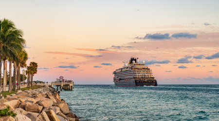 Miami, Florida, USA - December 24, 2024: Cruise ship tour. Travel by sea. Ship leaving harbor. Romantic vacation. Cruise ship voyage. Cruise in summer vacationの写真素材