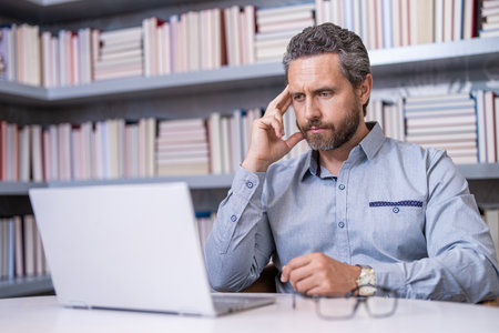 webinar tutorial online. study online. education for millenial man. remote webinar of man in workplace. video intrview on conference. estudy concept. online webinar education for man. Online learningの写真素材
