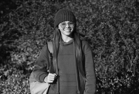 education for adolescence. teen girl in autumn park outdoor. autumn is a time to study. knowledge...