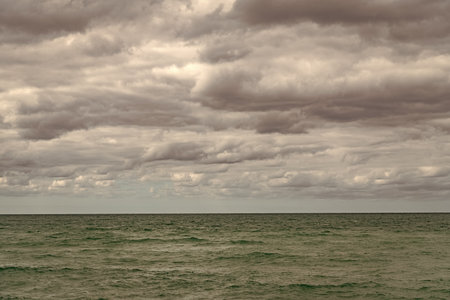 Sea horizon view. Cloudy sky and seascape. Skyscape with sea horizon. Calm horizon view at sea...