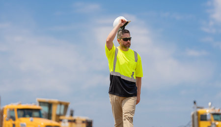 Supervisor civil engineer. Worker at construction site. Builder construction man. Worker with...