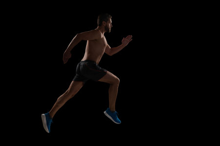 Muscular man running. Sportsman jogger running. Man sportsman running for exercise. Sport athlete...