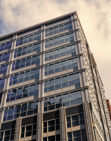 Architectural building in business area. Glass skyscraper. City architecture. Architecture of modern...