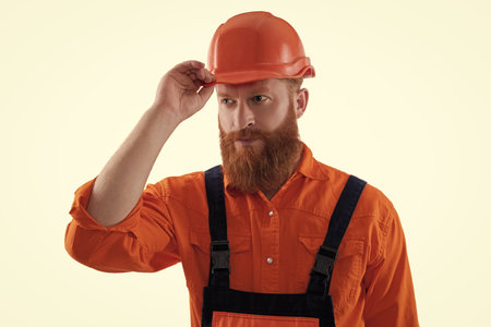 Civil engineer man. Supervisor or worker man. Bearded man construction worker. Workman isolated on white. Man builder engineer. Construction builder occupation. Construction managementの写真素材