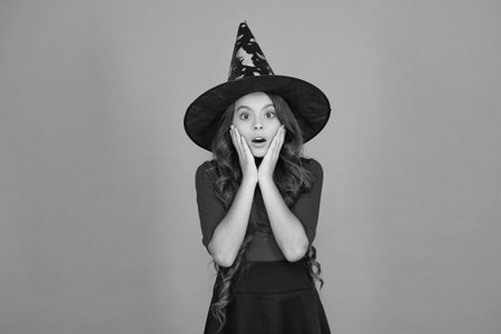 Trick or treat. Halloween costume party celebration. Halloween witch. Girl in Halloween witch...