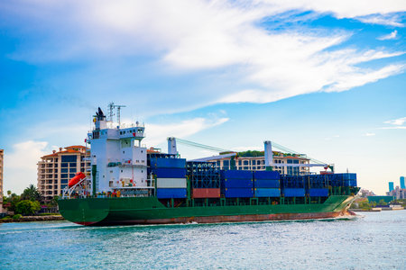 Cargo ship with container in Miami. Container on barge at Port Miami. Cargo ship barge at harbor...