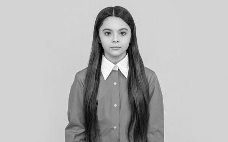 girl in school uniform. back to school. teenager student has caucasian face. teenager school girl in...