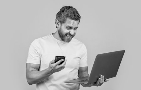 frustrated man assistant has call in studio. photo of man assistant has call with laptop.