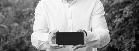 cropped view of businessman with online app. businessman with online app outdoor.
