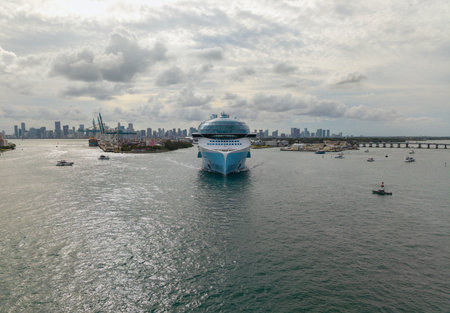 Cruise ship vacation and travel by sea. Aerial view luxury liner. Ship leaving Miami beach port....