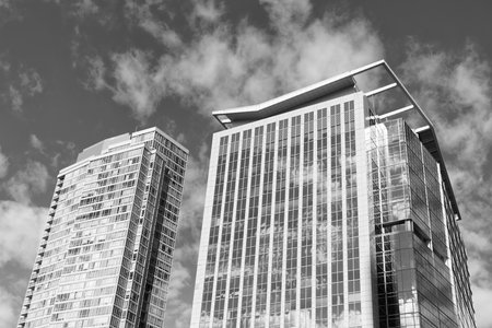 Glass building in metropolis. Skyscraper perspective view. City architecture. Architecture of modern glass building. Perspective city skyscraper. Modern skyscraper building. Building designの写真素材