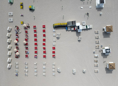 Aerial top view of sand beach with turquoise water. Luxury resort. Paradise beach. Summer vacation. Beach vacation at sea in summer. Sea relax under beach umbrella. Travel to sea. Seaside relaxationの写真素材