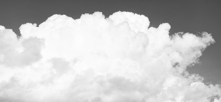 Blue Sky with Fluffy White Clouds on a Sunny Summer Day. Cloudscape - Blue sky and white clouds....