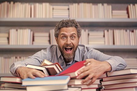 school education for teacher or student. school professor reading books in library. teacher of...