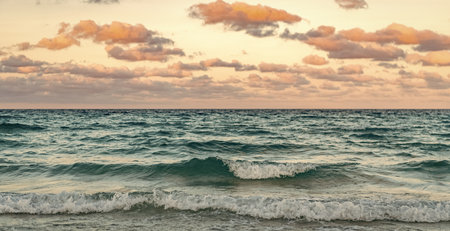 Sea horizon view. Cloudy sky and seascape at summer vacation. Skyscape with sea horizon. Calm horizon view at sea sunrise. Romantic summer vacation sunrise on seascape. Distant sea horizonの写真素材