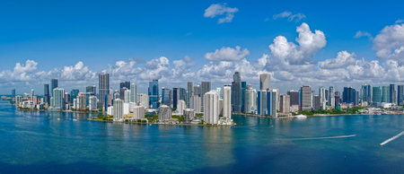 Aerial panorama of Brickell in Miami. Downtown Miami skyline on a sunny day. Scenic view of Miami Beach and Brickell. Brickell famous landmarks. Miami downtown landscape.の写真素材