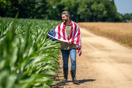 4th July. American labor day. American flag and man farmer. Flag of USA. Independence day. Man in...