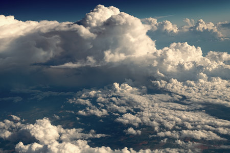 Blue Sky with Fluffy White Clouds on a Sunny Summer Day. Cloudscape - Blue sky and white clouds....