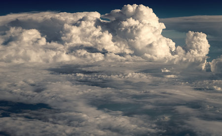 Blue Sky with Fluffy White Clouds on a Sunny Summer Day. Cloudscape - Blue sky and white clouds....