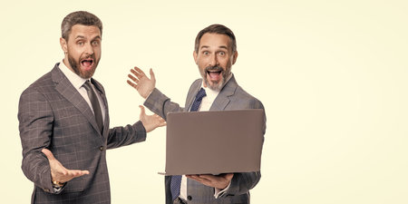 businessmen freelancer isolated on white. communication. freelance men post blog online. freelance working online. businessmen use laptop for freelancing. business computer freelancing. bannerの写真素材