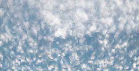 Blurred defocused background. Blur glitter backdrop. Glitter shimmer background. Defocused shimmer....