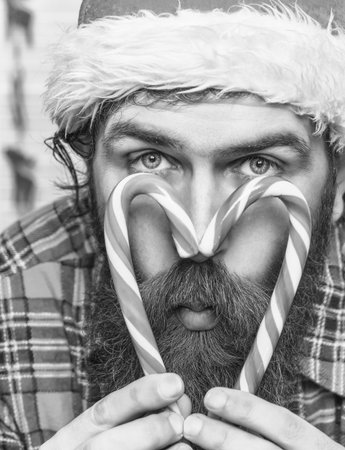 Happy Ney Year. Xmas holiday celebration. Surprised Santa man at New Year eve. December holiday...