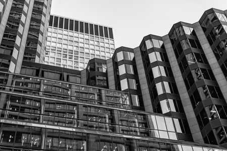 City downtown with skyscraper in perspective. Perspective view. Skyscraper building architecture. Skyscraper with glassy facade. Modern city perspective. Skyscraper in metropolis city. Diversityの写真素材